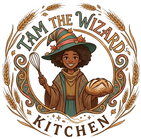 The Wizards Kitchen logo — illustrated baker with curly hair wearing a green witch hat, holding a whisk